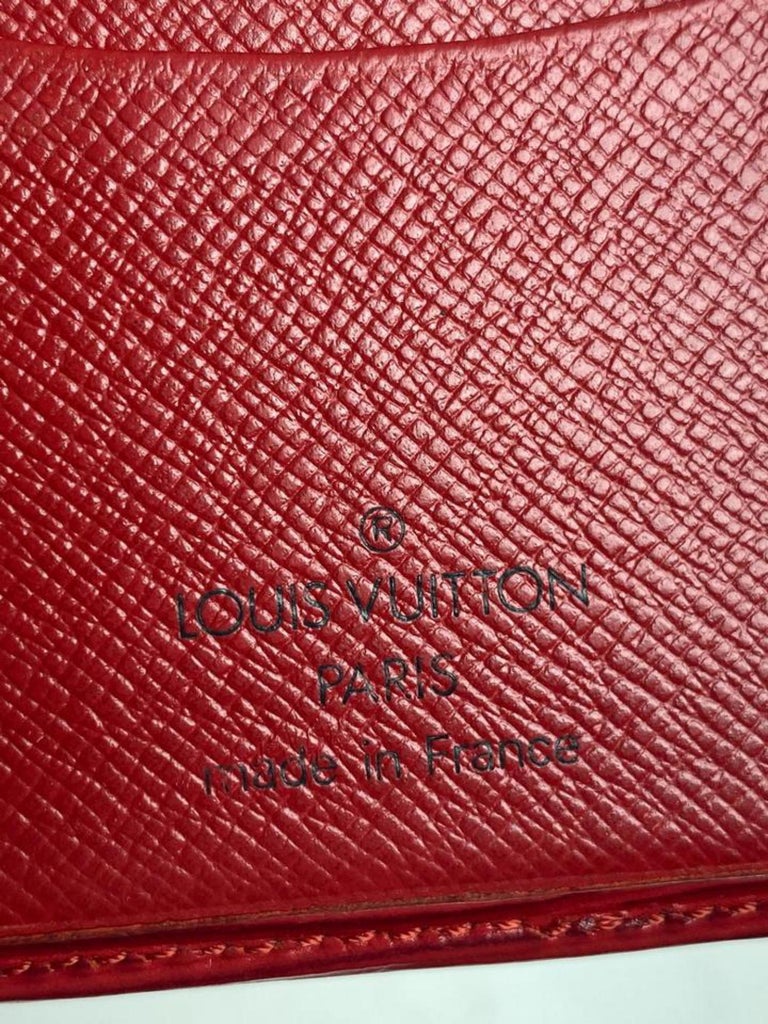 Leather wallet Louis Vuitton Red in Leather - 24294092