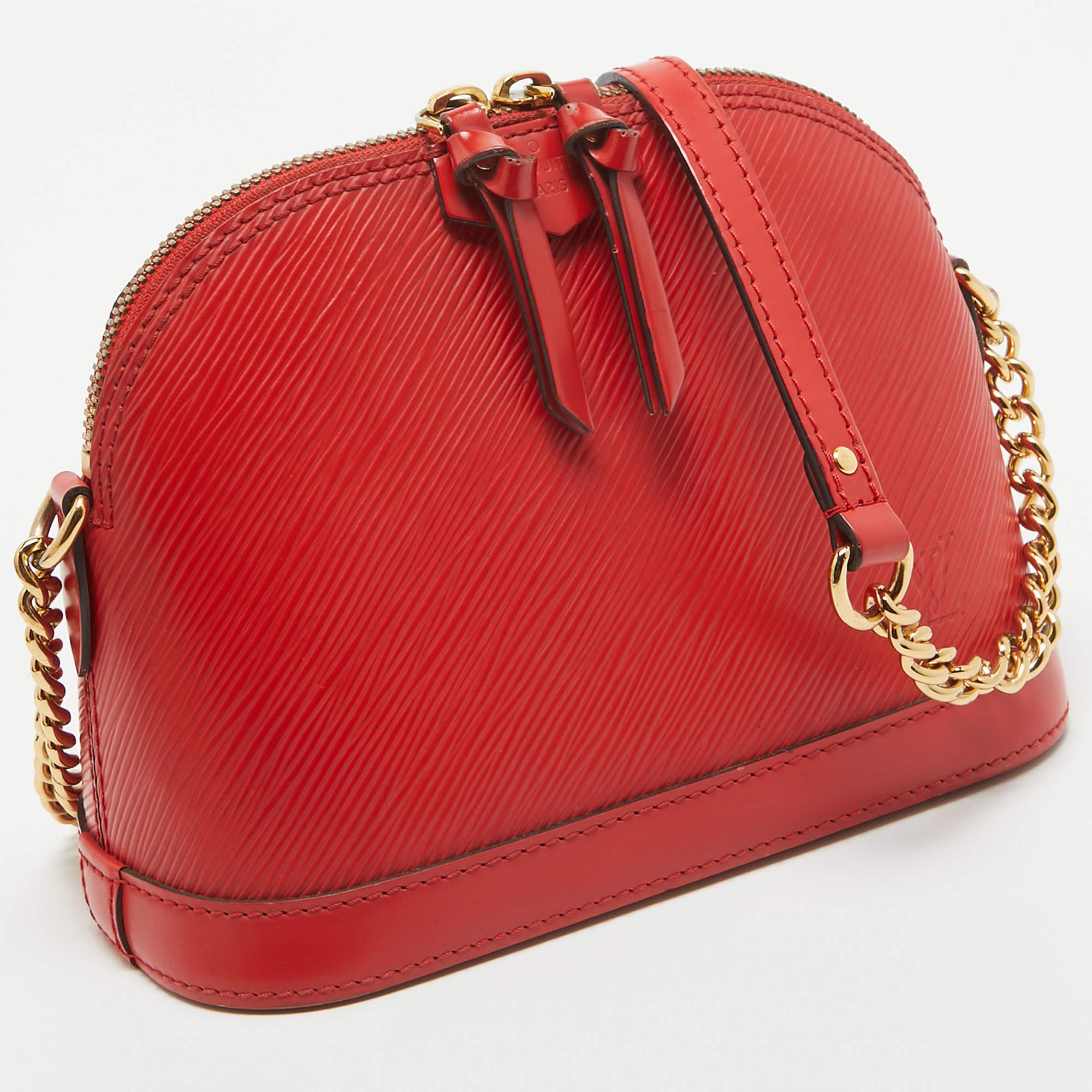 Rouge Louis Vuitton mini sac Alma en cuir épi rouge