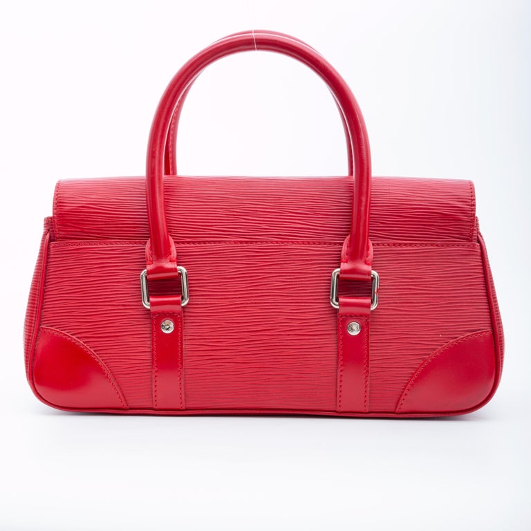 👜 This gorgeous LOUIS VUITTON Red Epi Leather Segur PM Bag