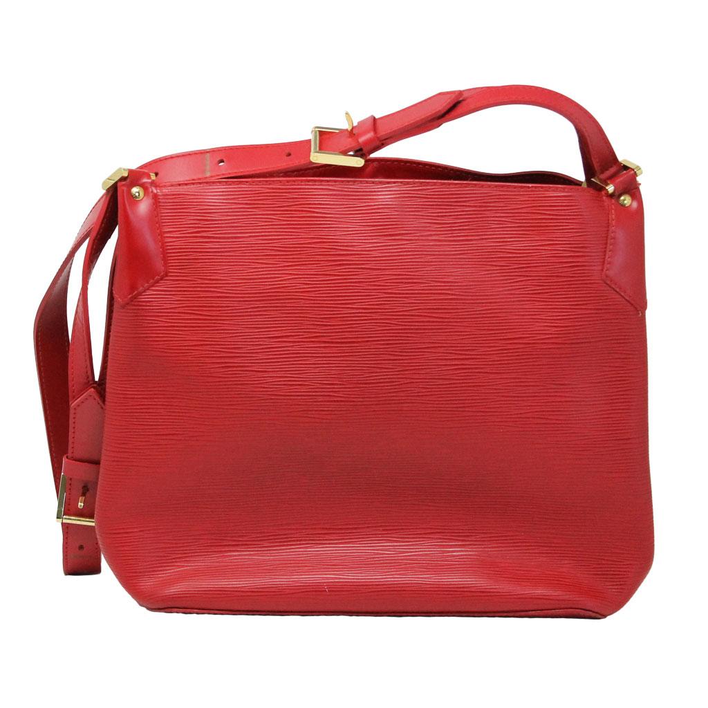 Brand: Louis Vuitton
Handles: Red leather adjustable shoulder strap, 11.5