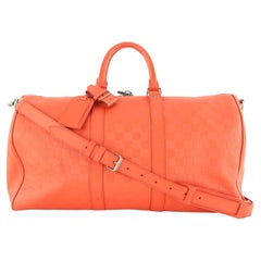 Damier Infini Leder Keepall Bandouliere von Louis Vuitton in Rot, Fusion, 45 8LVJ1025