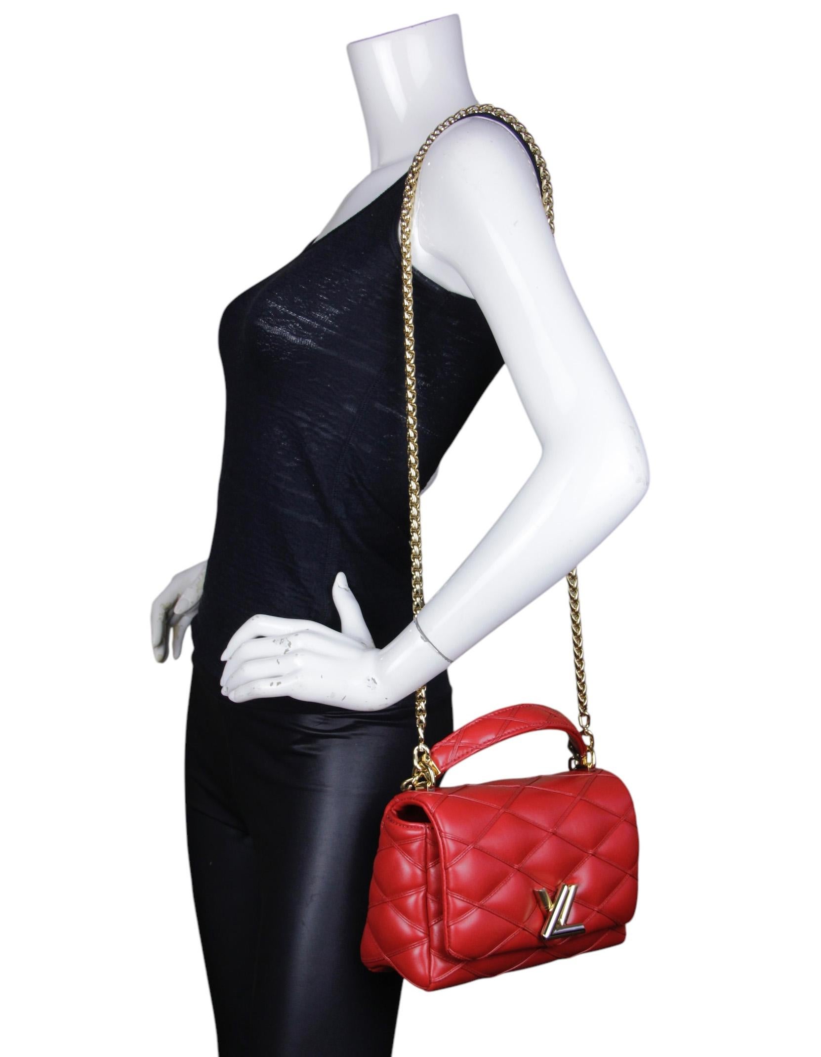 Louis Vuitton Red Lambskin Malletage Top Handle GO-14 MM Bag

Made In: France
Color: Red
Hardware: Goldtone
Materials: Lambskin leather
Lining: Sheepskin leather
Closure/Opening: Flap top with magnetic closure
Interior Pockets: One zip