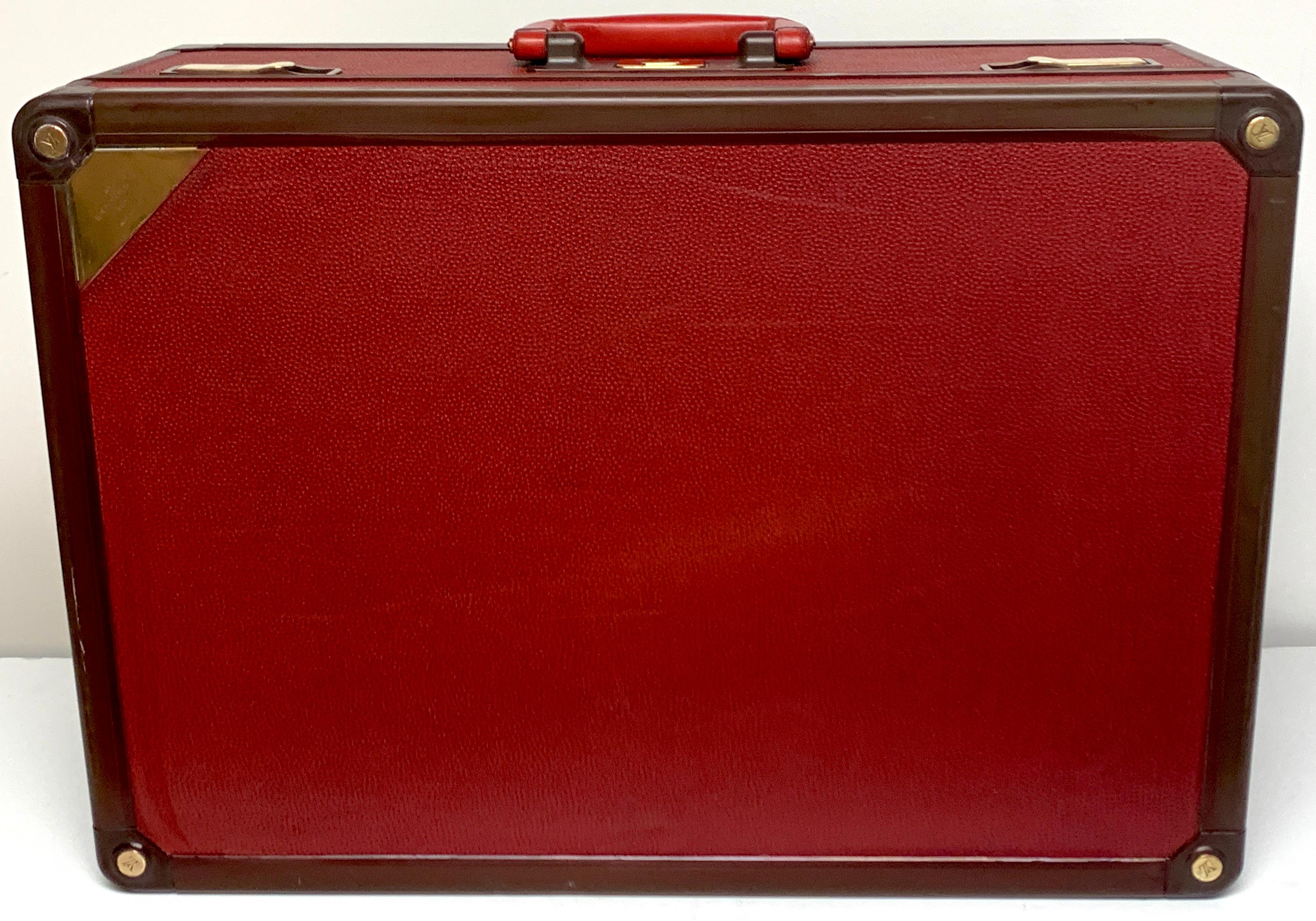 Louis Vuitton red leather Le Challenge (Americas Cup) suitcase, 1987
Red textured Calfskin, rare only made for one year, Americas Cup Challenge Suit Case
Brass lock number 1021718
Interior serial number C00-1547
No Key.