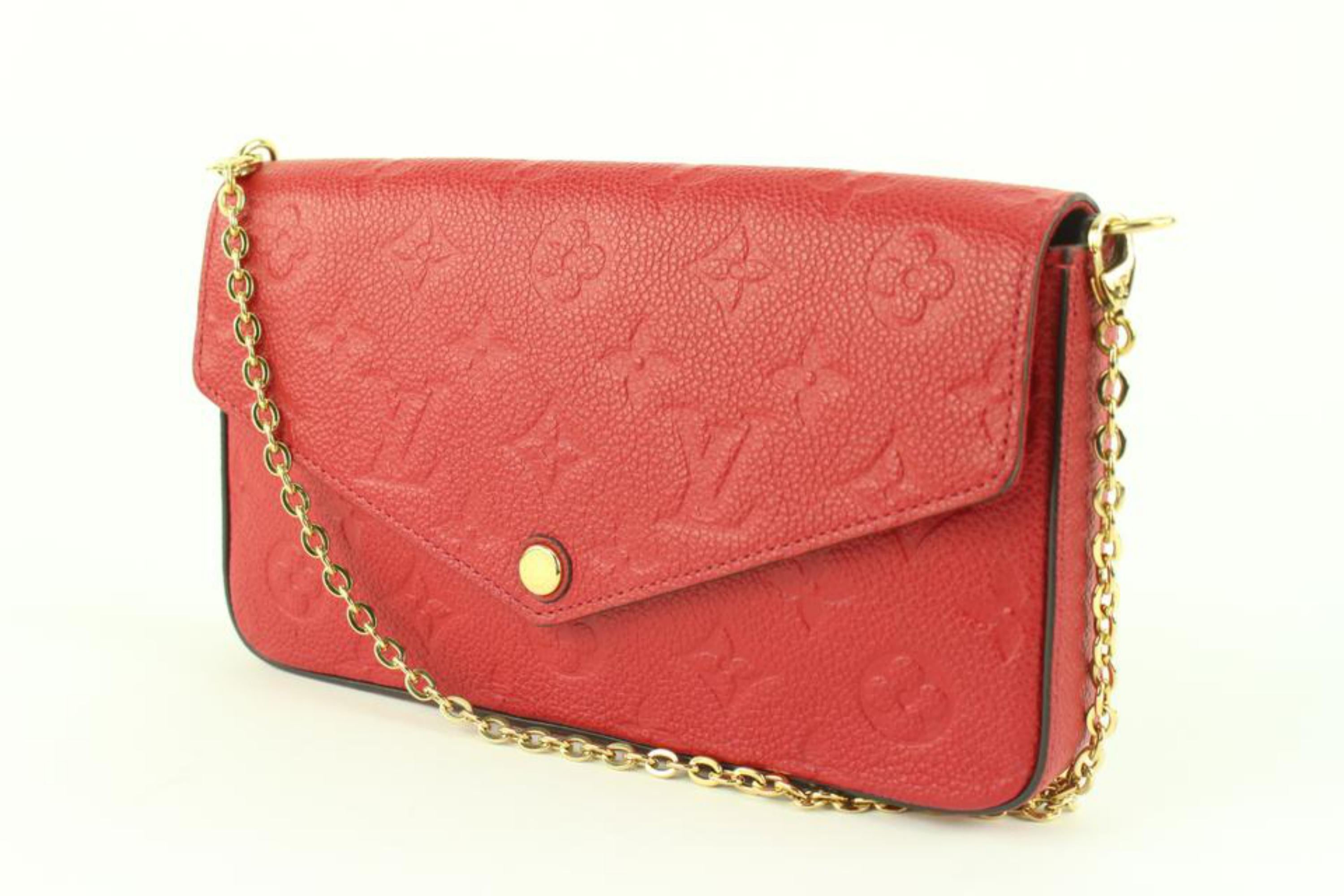 Louis Vuitton Red Leather Monogram Empreinte Pochette Felicie Crossbody Bag 112LV36
Date Code/Serial Number: FH2290
Made In: Italy
Measurements: Length:  8.5