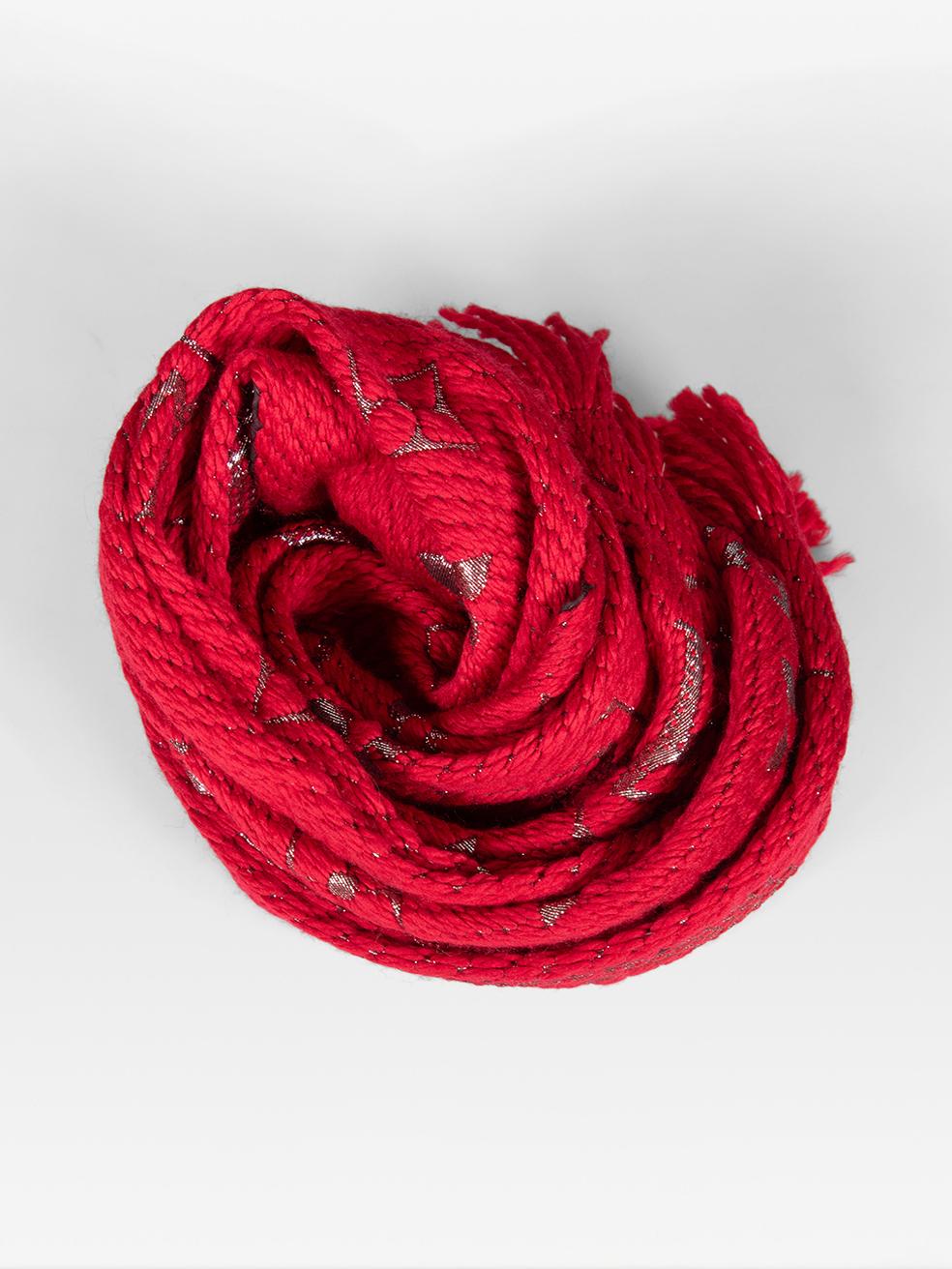 CONDITION is Very Good. Hardly any visible wear to the scarf is evident on this used Louis Vuitton designer resale item.
 
 Details
 
 Model: Logomania
 
 Red
 
 Wool
 
 Scarf
 
 Rectangular
 
 Silver metallic monogram knit
 
 Fringed ends
 
 
 
