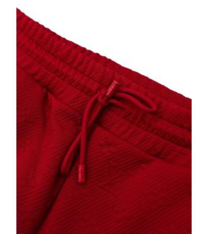 Louis Vuitton Red Monogram Embossed Track Pants For Sale 1