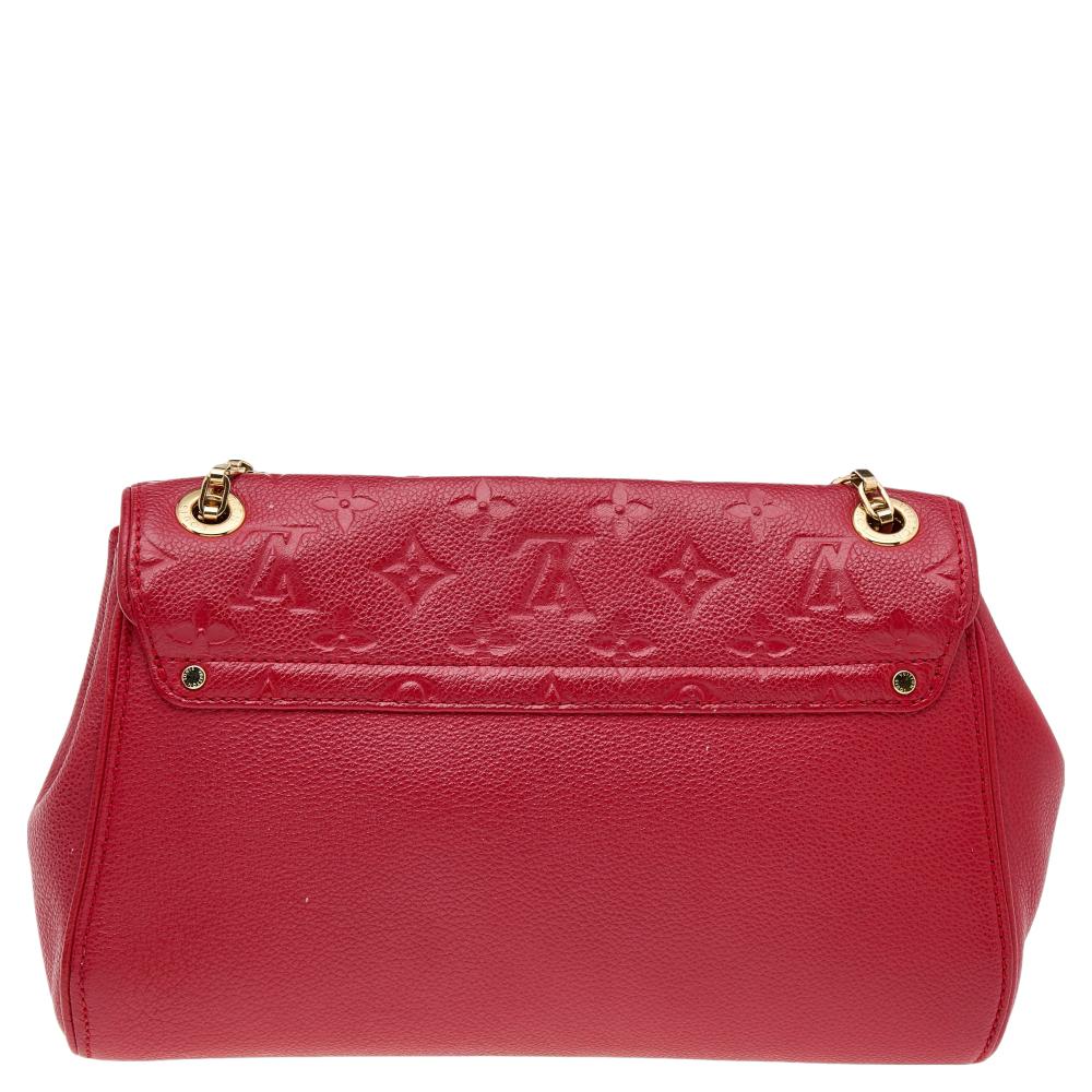 A perfect bag to instantly get recognized is this St Germain bag from Louis Vuitton. Crafted in red leather, the flap of this pretty bag is embossed with the signature pattern along with a gold-tone S-lock closure. The Alcantara-lined interior is