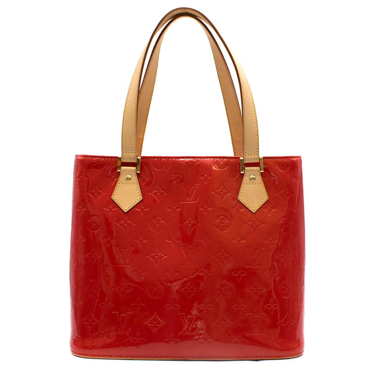 Louis Vuitton Red Vernis leather Houston tote bag & coin purse

Bag
- Red, monogram Vernis leather
- Two brown leather top handles, piped leather base 
- Top-zip closure, gold-tone metal logo engraved padlock zip
- Internal zip and slip pocket 
-