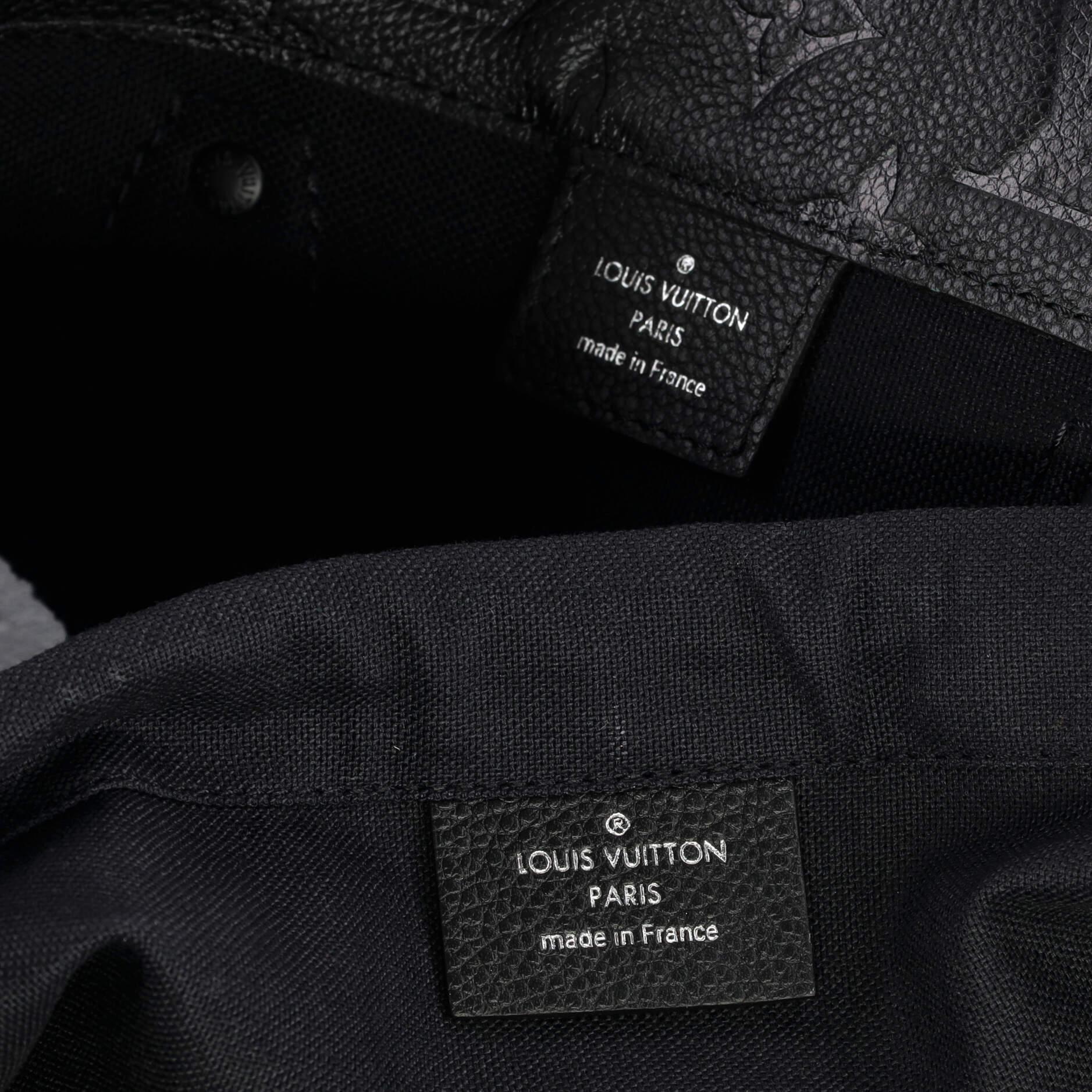 Louis Vuitton Rei Kawakubo Bag with Holes Monogram Empreinte Leather MM For Sale 1