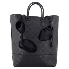 Louis Vuitton Rei Kawakubo Tasche mit Löchern und Monogramm aus Empreinte Leder MM