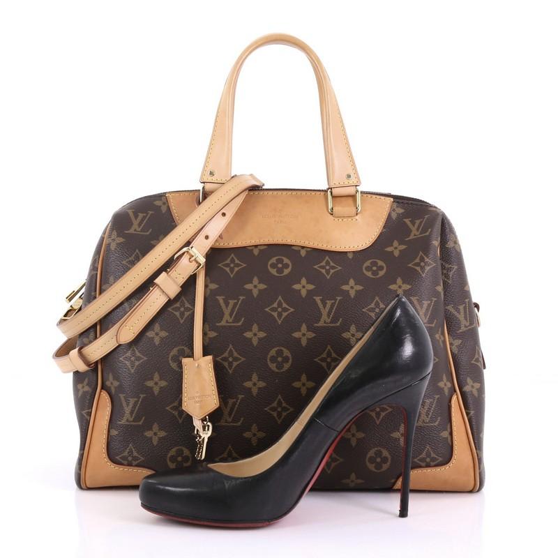 This Louis Vuitton Retiro NM Handbag Monogram Canvas, crafted in brown monogram coated canvas, features dual flat leather handles, leather trim, and gold-tone hardware. Its zip closure opens to a purple microfiber interior with slip pockets.