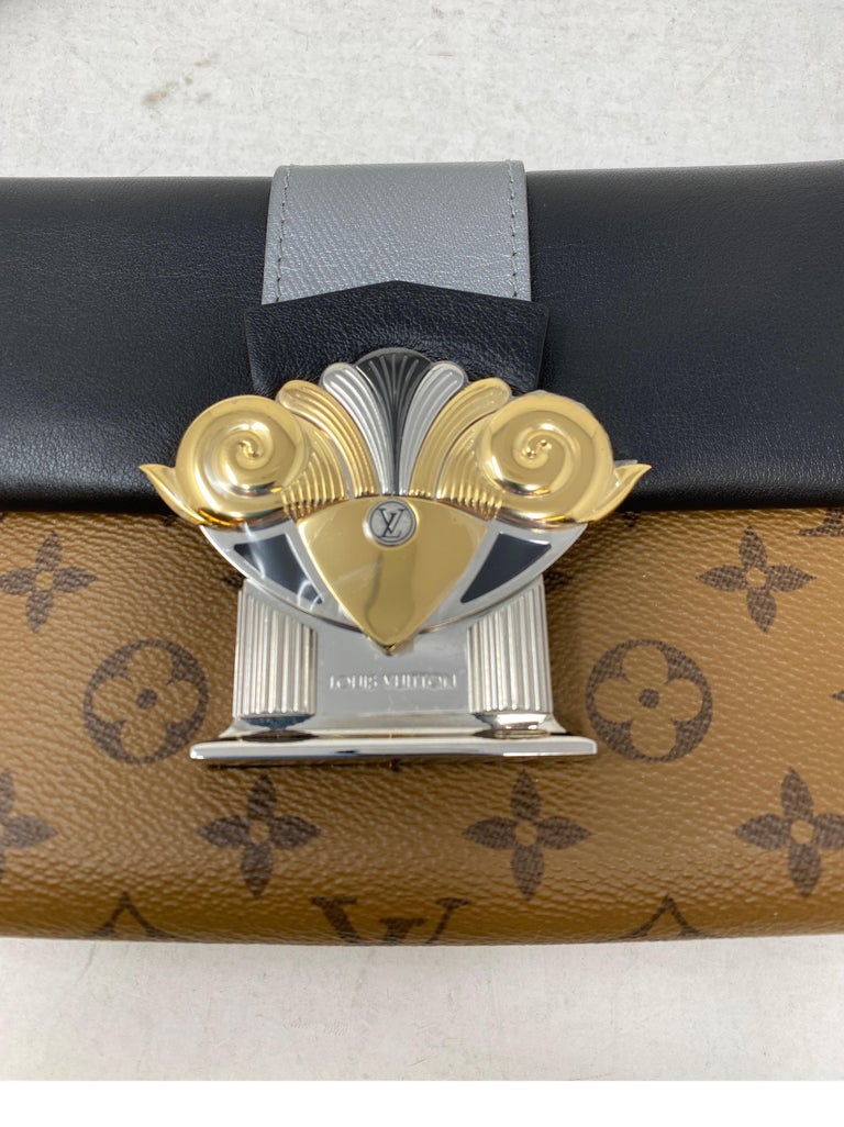 Louis Vuitton Reverse Clutch Evening Bag at 1stDibs