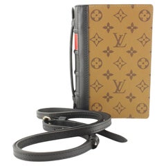 Louis Vuitton Portemonnaie mit umgekehrtem Monogramm und Buchkette 2LK0105