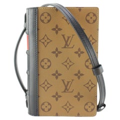 Louis Vuitton LV Twinny Monogram Reverse in Coated Canvas with Gold-tone -  US