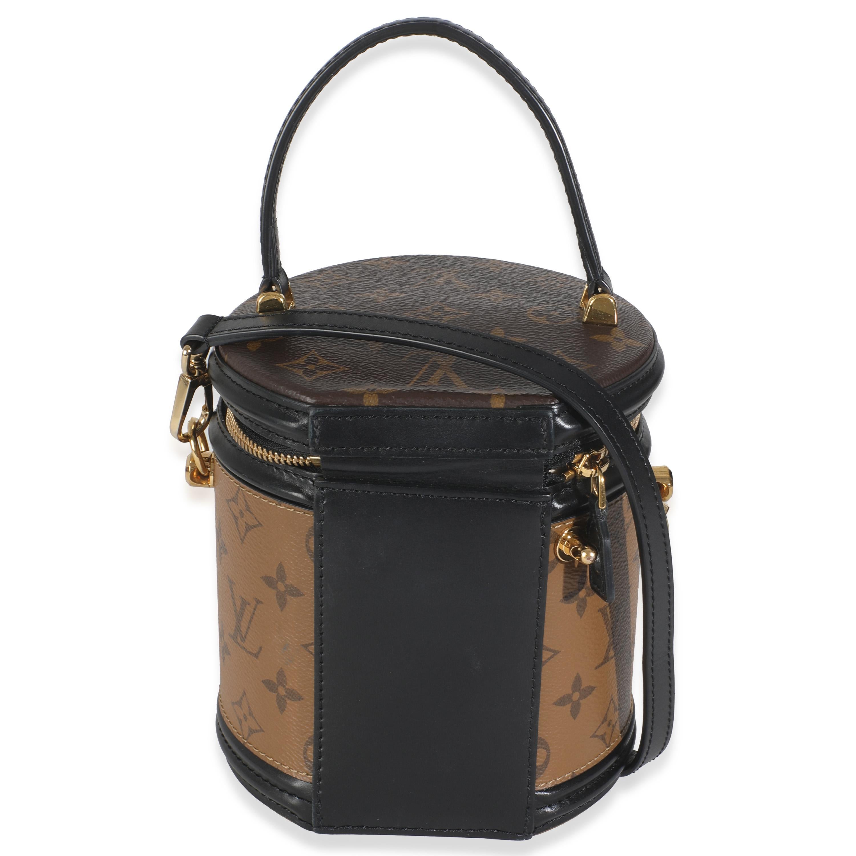 Listing Title: Louis Vuitton Reverse Monogram Canvas Cannes
SKU: 146035
Condition: Pre-owned 
Handbag Condition: Very Good
Condition Comments: Item is in very good condition with minor signs of wear. Light scuffing along base. Scratching along