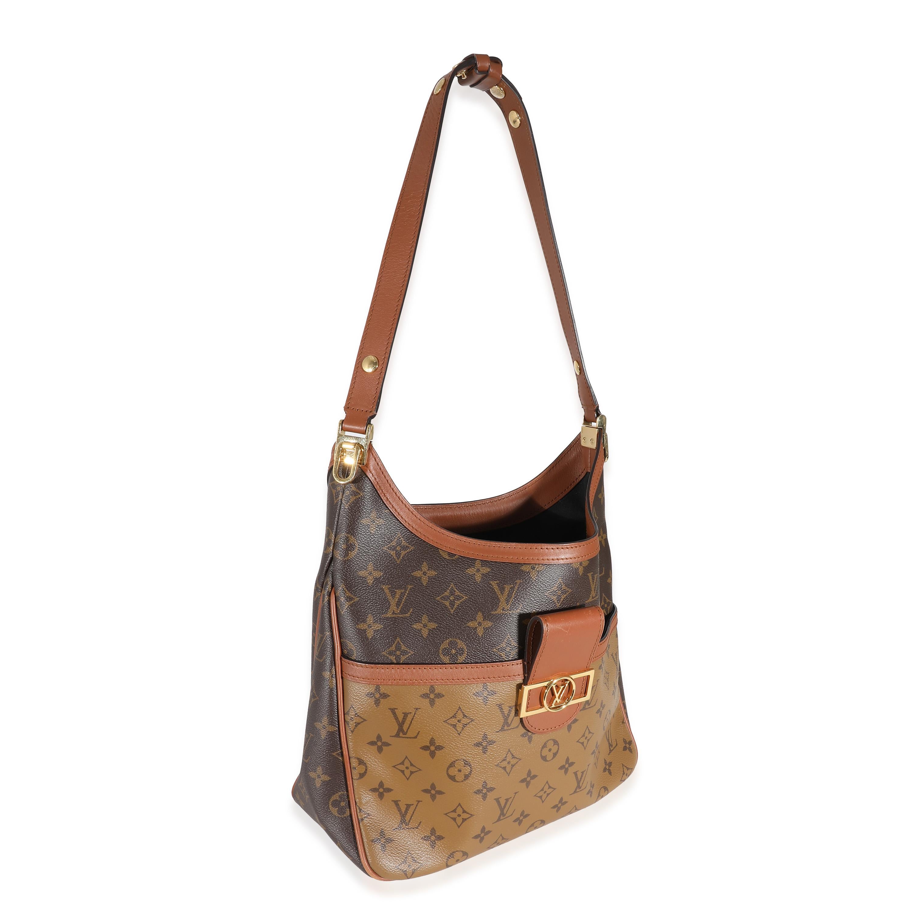Listing Title: Louis Vuitton Reverse Monogram Canvas Dauphine Hobo
SKU: 137732
Condition: Pre-owned 
Handbag Condition: Good
Condition Comments: Item is in good condition with apparent signs of wear. Scuffing along all four corners. Scratching along