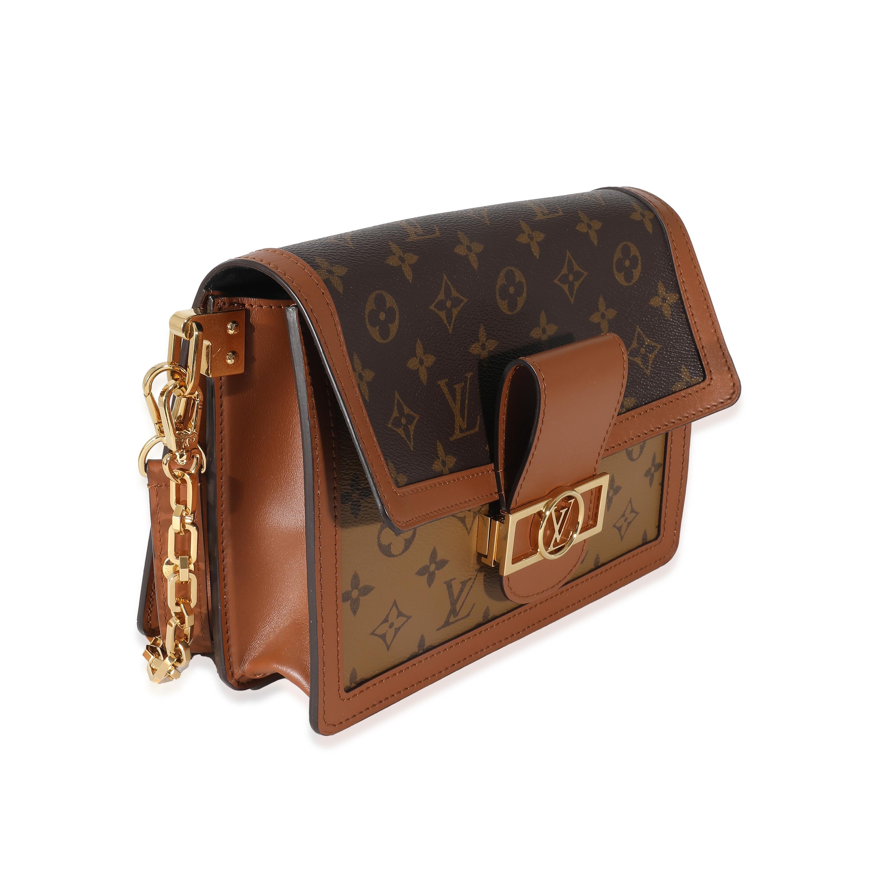 Listing Title: Louis Vuitton Reverse Monogram Canvas Dauphine MM
SKU: 136624
Condition: Pre-owned 
Handbag Condition: Excellent
Condition Comments: Item is in excellent condition and displays light signs of wear.  Light scuffing along interior.