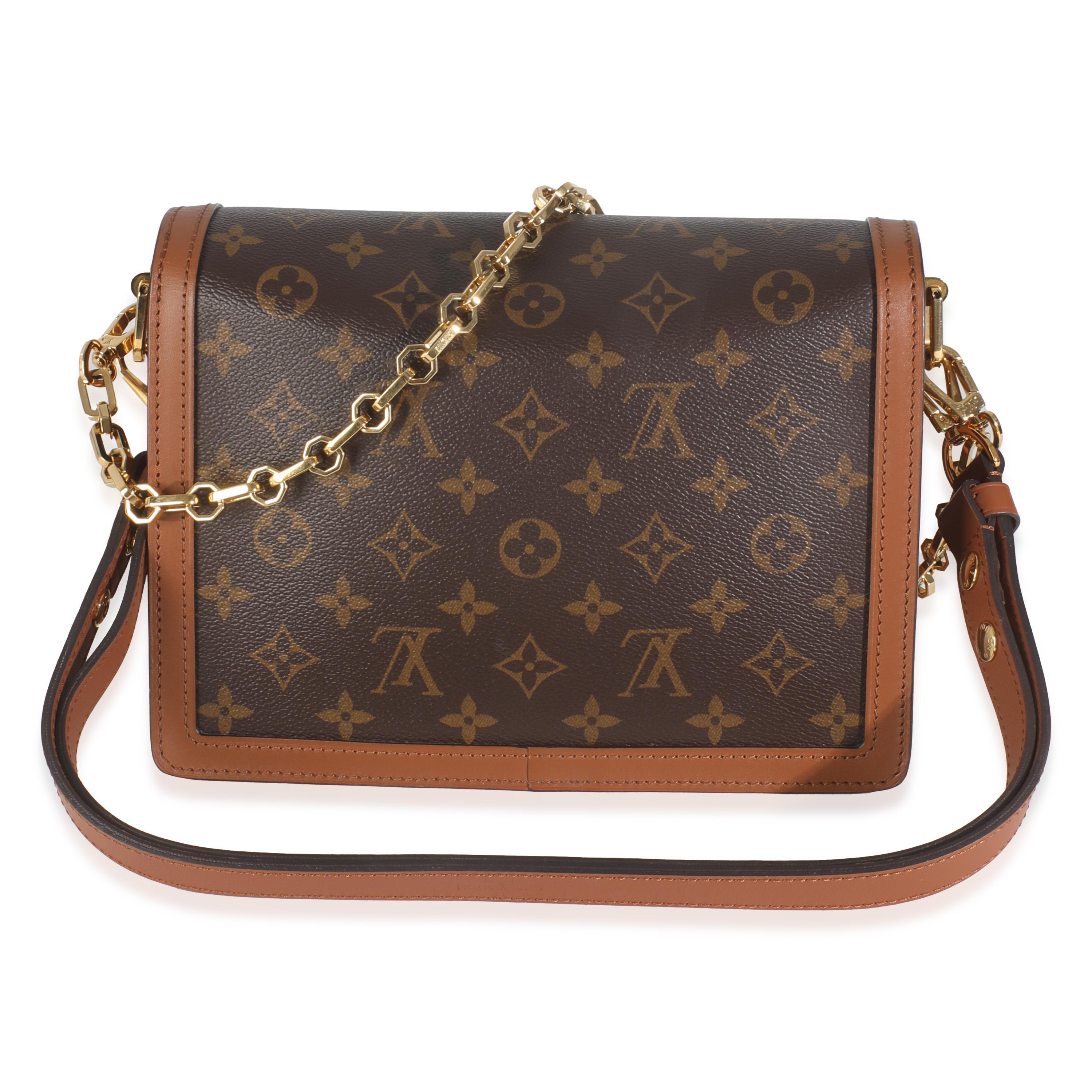 Listing Title: Louis Vuitton Reverse Monogram Canvas Dauphine MM
SKU: 145859
Condition: Pre-owned 
Handbag Condition: Very Good
Condition Comments: Item is in very good condition with minor signs of wear. Wear along corners. Minor scratching along