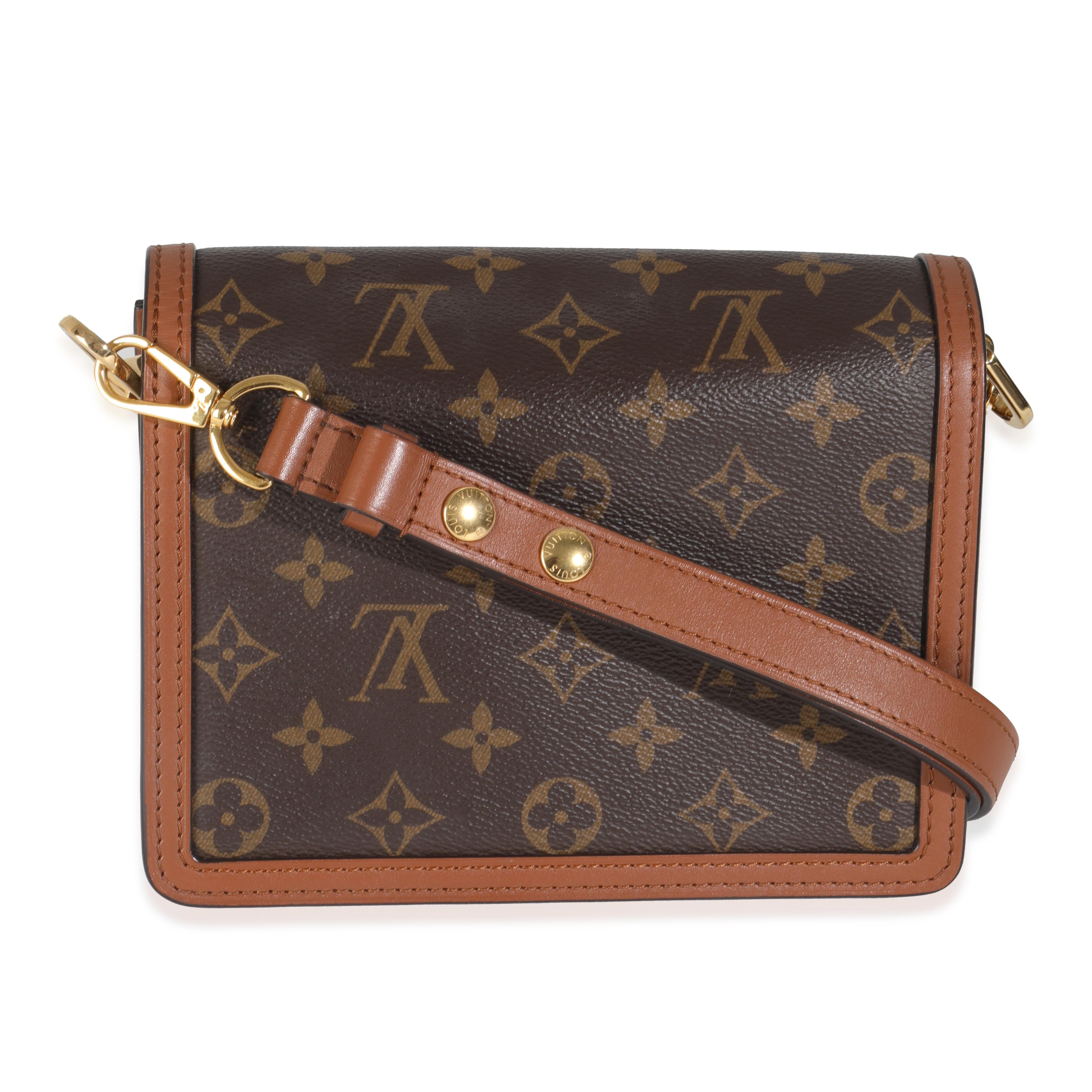 Listing Title: Louis Vuitton Reverse Monogram Canvas Mini Dauphine
SKU: 145070
MSRP: 3450.00 USD
Condition: Pre-owned 
Handbag Condition: Very Good
Condition Comments: Item is in very good condition with minor signs of wear.  Scratches along