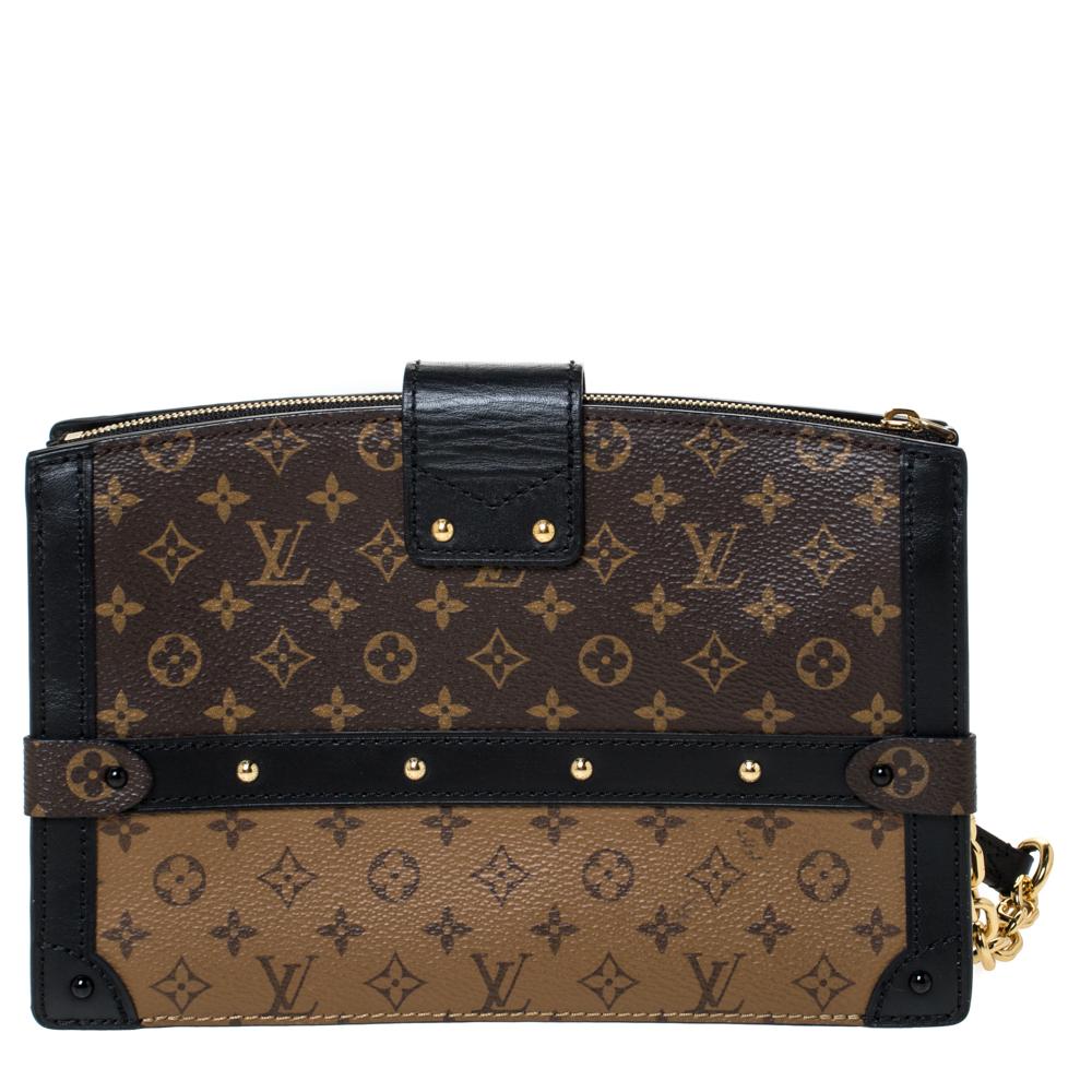 Released as part of Louis Vuitton's Fall 2018 collection by Nicholas Ghesquiere, the Trunk Clutch is like a beautiful reiteration of the Petite Malle. Crafted from Monogram and Monogram Reverse canvas, the clutch bag is light and spacious. It has