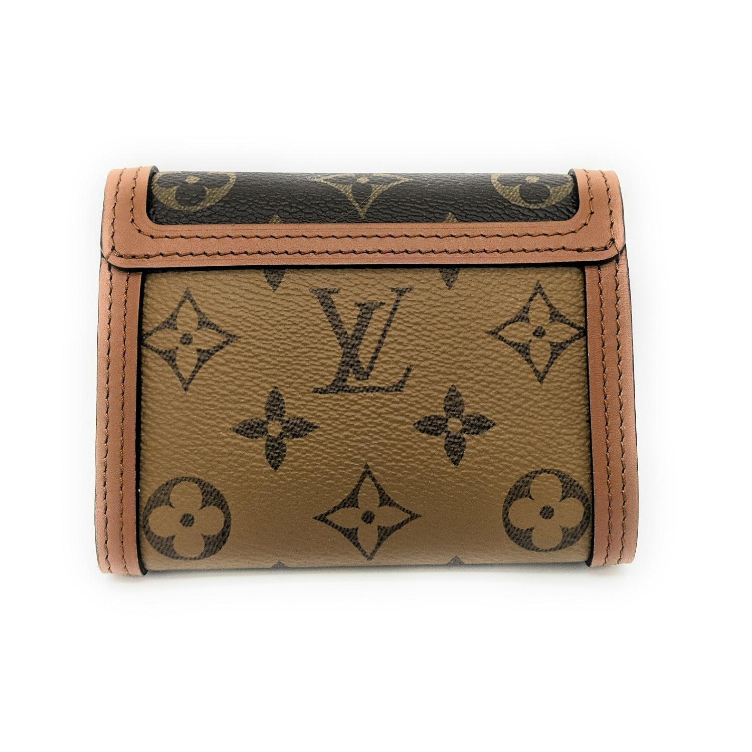 The Dauphine compact wallet takes its style cues from the emblematic Dauphine handbag. Its finely crafted design combines Monogram and Monogram Reverse canvas with calfskin trim, while it is secured by a magnetic Dauphine-signature clasp. This
