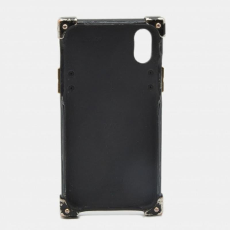 What's not to love about items that are both functional and statement-making! This stunning Louis Vuitton iPhone X case has been crafted from Reverse monogram canvas and styled to resemble their famous trunk designs. The creation has gold-tone metal