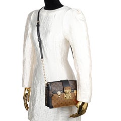 LOUIS VUITTON Reverse Monogram Trunk Clutch