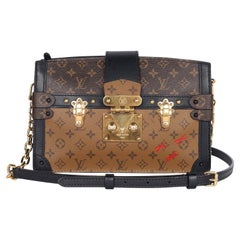 LOUIS VUITTON Reverse Monogram Trunk Clutch