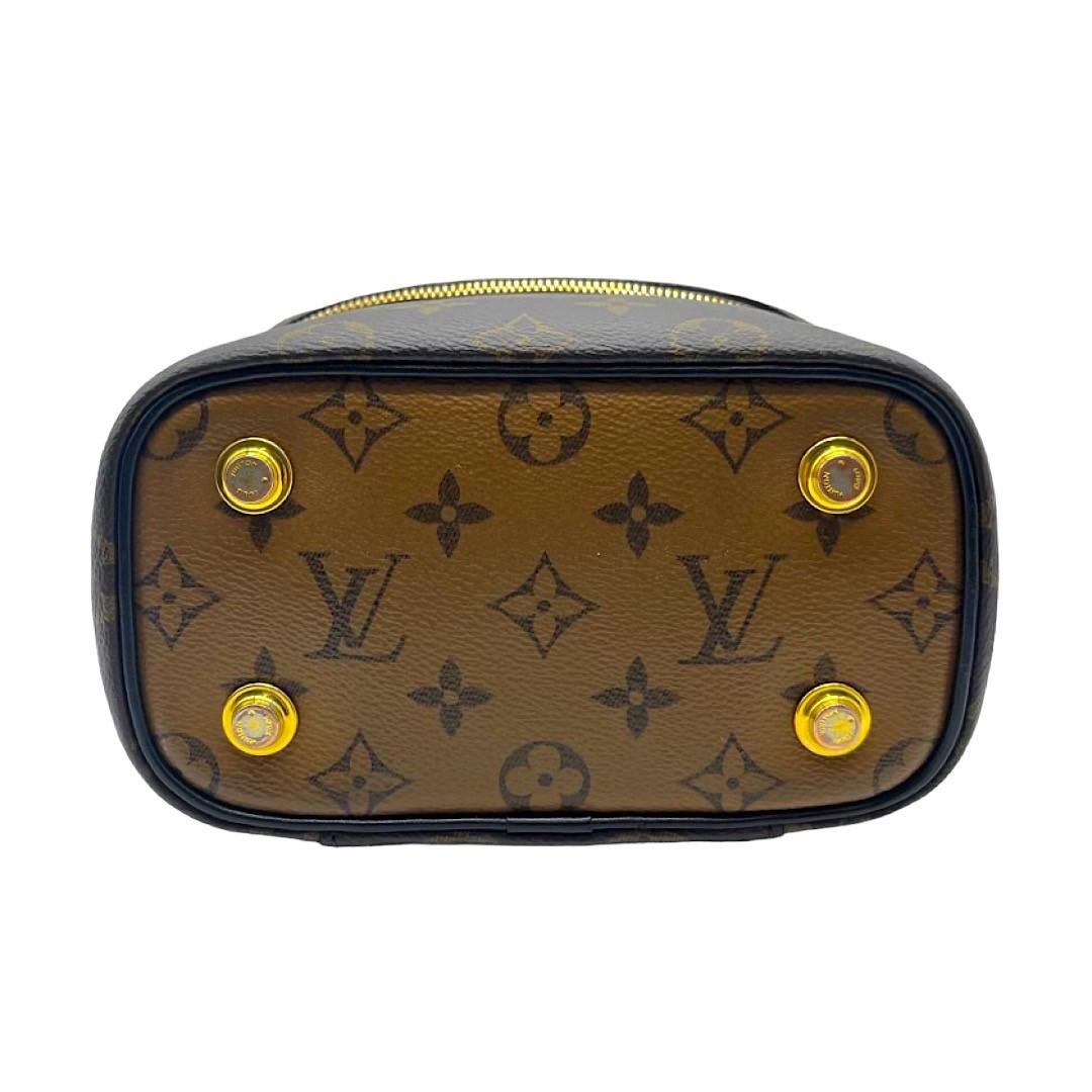 Neceser Louis Vuitton Monograma Reverso PM Negro