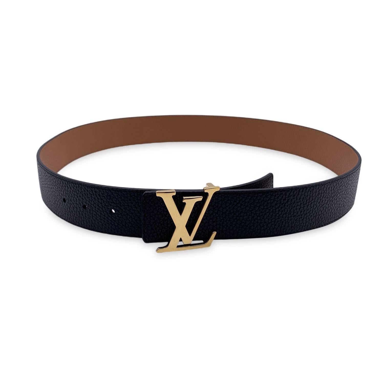 This beautiful belt will come with a Certificate of Authenticity provided by Entrupy. The certificate will be provided at no further cost

LOUIS VUITTON reversible 'LV Initiales' belt. Made of fine black and beige Taurillon leather. The belt