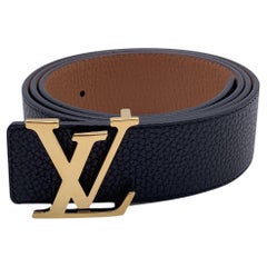 Ceinture réversible noire et beige avec boucle LV logo Louis Vuitton, taille 110/44