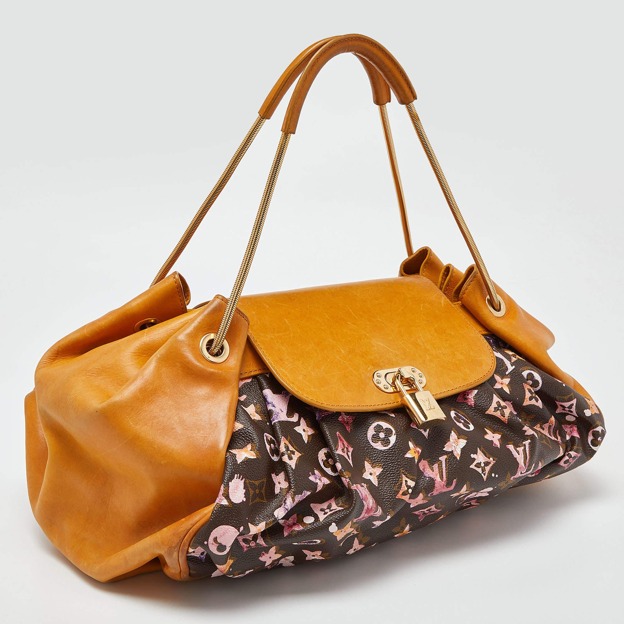 For their Spring/Summer 2008 line, Louis Vuitton collaborated with Richard Prince. The Monogram Watercolor, inspired by Prince's paintings, comes alive in 17 different colors on this Jamais bag. It has a Monogram coated canvas & leather exterior, an