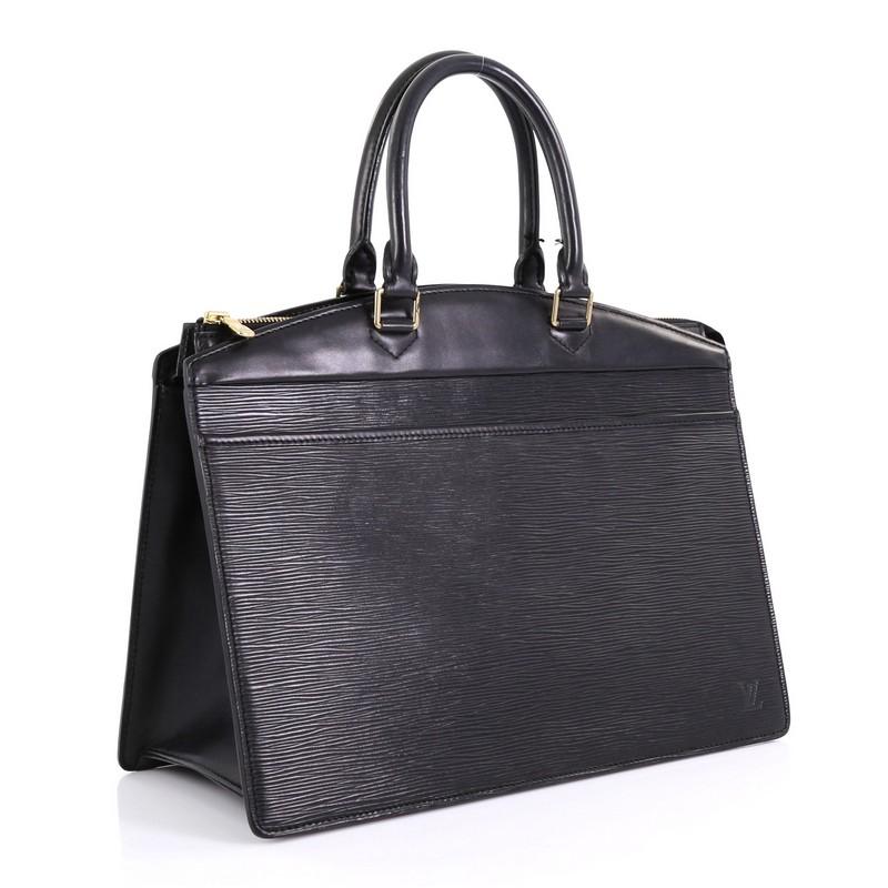 This Louis Vuitton Riviera Handbag Epi Leather, crafted from black epi leather, features dual rolled leather handles, full-length exterior front pocket, subtle LV monogram side logo, and gold-tone hardware. Its top zip closure opens to a gray