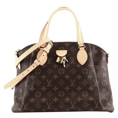 Louis Vuitton Rivoli Handtasche Monogramm Segeltuch MM