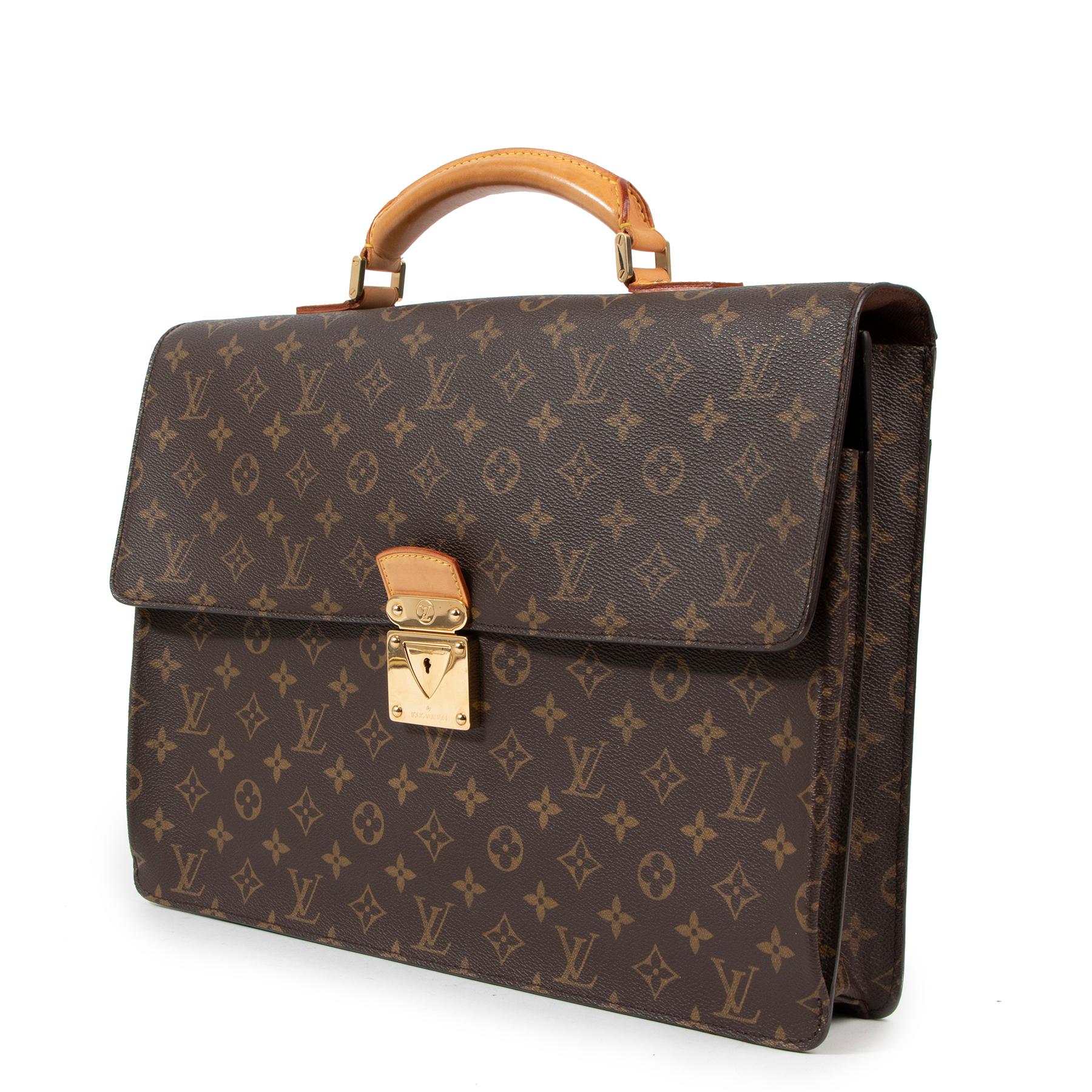Crafted in iconic Monogram canvas, the sleek and sophisticated S-Lock Briefcase features an array of stylish details, from the gold push lock styled after a historic Louis Vuitton trunk lock to the study leather top handle. A secure and practical