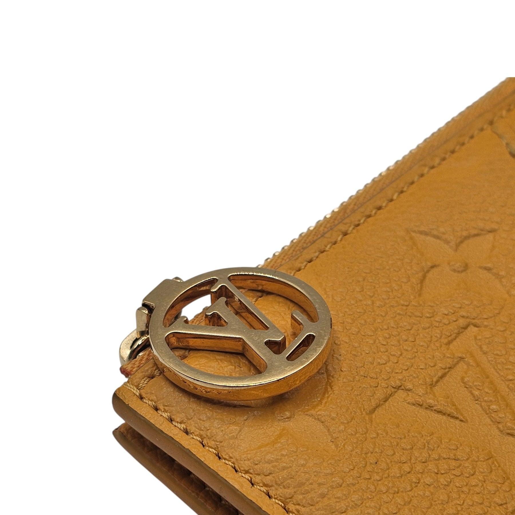 Women's Louis Vuitton Romy Monogram Empreinte Card Case M11412 - Leather - Yellow For Sale