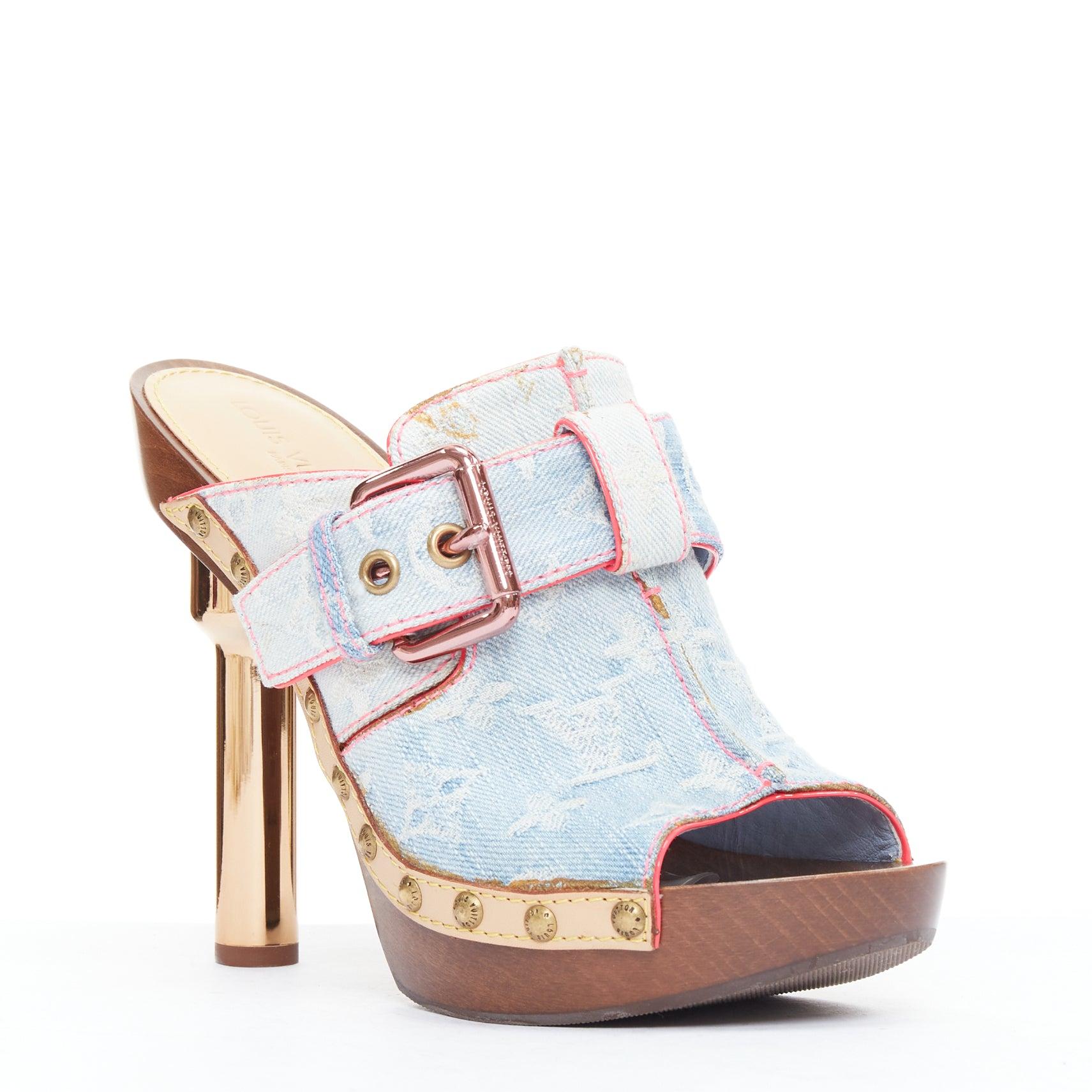 LOUIS VUITTON Rosa 2010 blue denim pink stitch monogram mules EU37.5
Reference: TGAS/E00352
Brand: Louis Vuitton
Designer: Marc Jacobs
Model: SS 2010
Material: Denim, Wood, Leather
Color: Blue, Brown
Pattern: Monogram
Closure: Slip On
Lining: Nude
