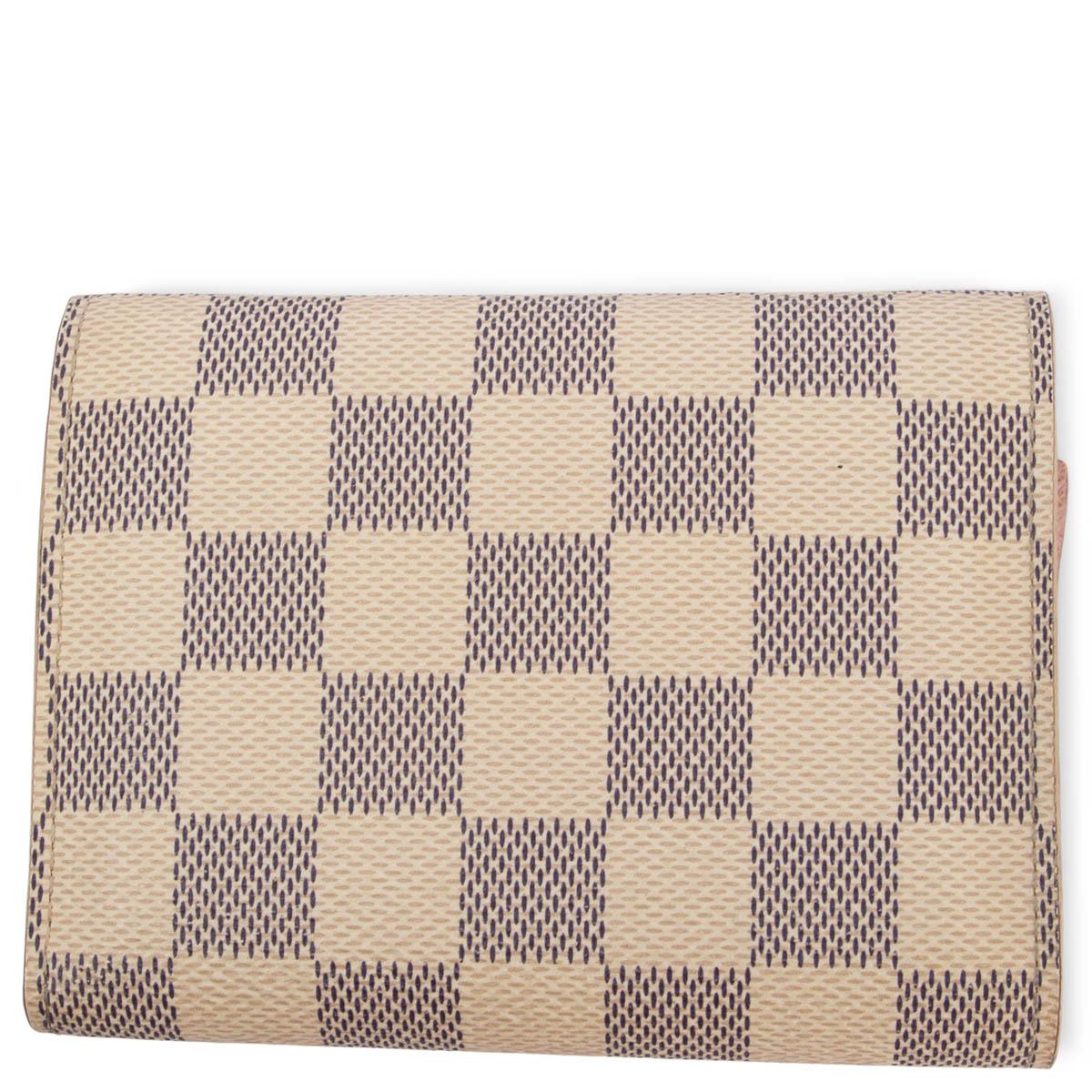 100% authentic Louis Vuitton Victorine Damier Azur and Rose Ballerine Pink wallet with grained cowhide-leather trim and lining. Opens with a press-stud closure to an interior with 6 card slots, zipped coin pocket, bill pocket and 2 flat pockets. Has