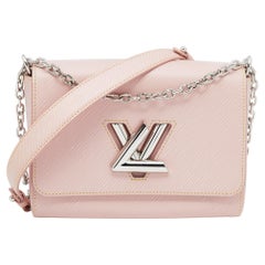 Louis Vuitton - Sac Ballerine en cuir épi rose « Twist » MM