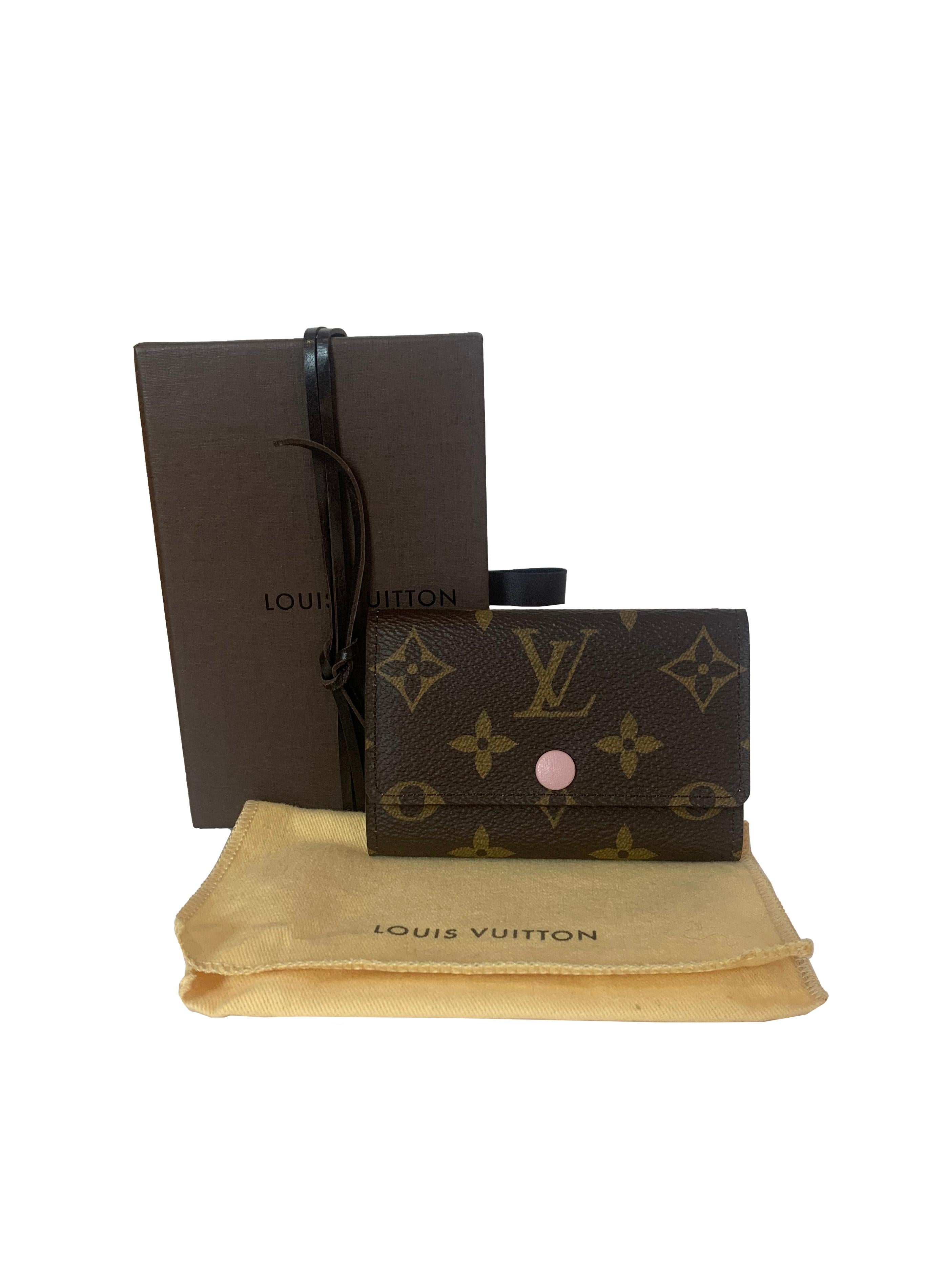Louis Vuitton Rose Ballerine Pink & Monogram Multicles 6 Key Holder. M60701

Made In: France
Year of Production: 2015
Color:Brown and pink
Hardware: Goldtone
Materials: Coated canvas with leather snap button
Lining:Pink cross-grain leather