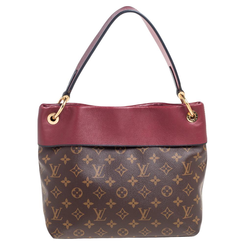 Louis Vuitton's Tuileries Besace bag in monogram canvas has a folded top design in leather for a beautiful contrast. It is lined with Alcantara and held by a top handle, and an optional strap for shoulder or crossbody wear.

Includes: Original