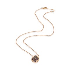 Pendentif « Blossom Sun » de Louis Vuitton, couleur or rose et nacre