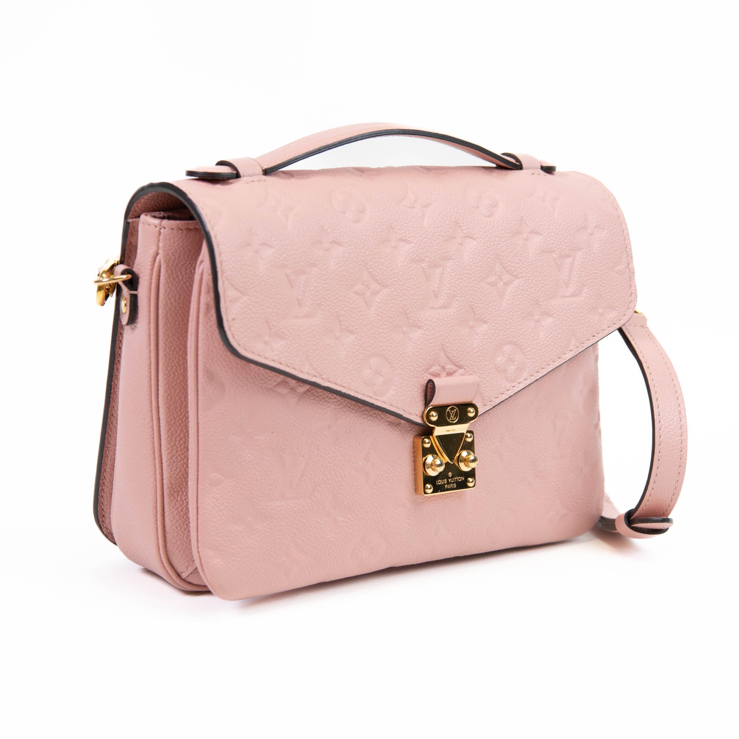 100% Authentic

This chic handbag is finely crafted of Louis Vuitton monogram calfskin pink leather. The shoulder bag features a pink leather top handle, an optional adjustable pink leather shoulder strap, a rear exterior zipper pocket and a