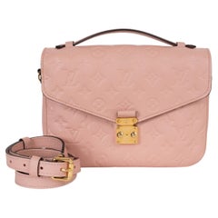 LOUIS VUITTON Rose Poudre Monogram Empreinte leather POCHETTE METIS Bag
