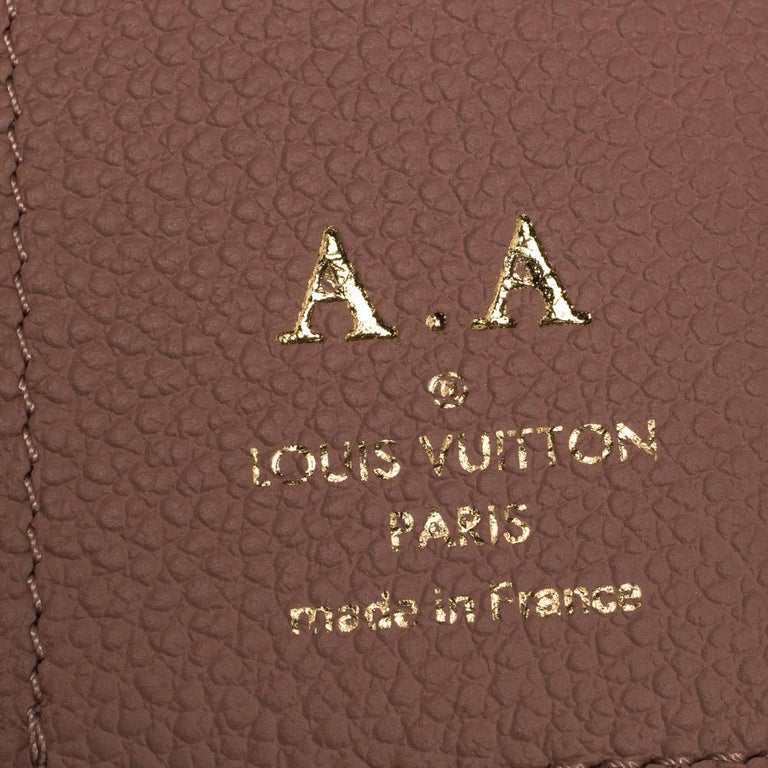 Louis Vuitton Rose Poudre Monogram Empreinte Leather Zoe Wallet Louis  Vuitton