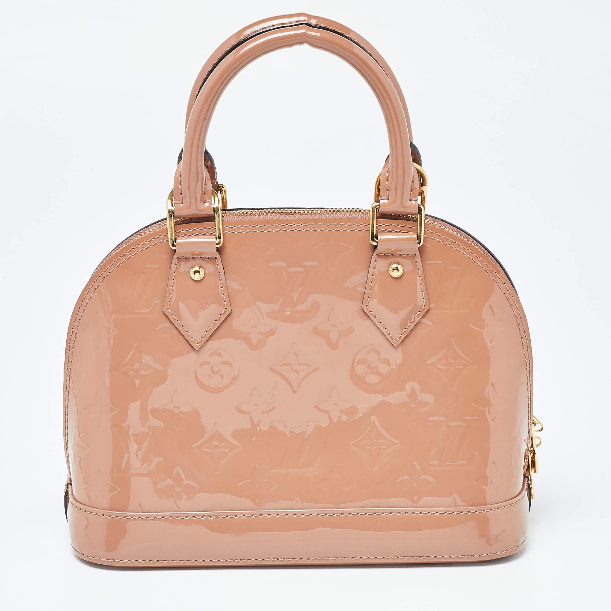 The Louis Vuitton Alma BB comes crafted from Monogram Vernis, featuring double zippers with a fabric interior. Two handles and a strap are provided for you to parade it elegantly. Make this Alma yours today!

Includes: Original Dustbag, Detachable