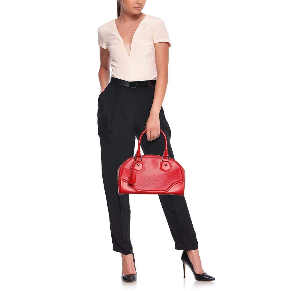 The fashion house's tradition of excellence coupled with modern design sensibilities works to make this LV red bag one of a kind. Its a fabulous accessory for everyday use.