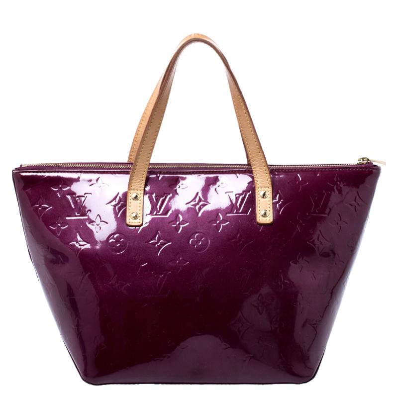 Looking for an every-day bag with just the right tinge of luxury? Your quest ends here with this Bellevue from Louis Vuitton. Wonderfully crafted from Monogram Vernis, the bag brings a lovely burgundy shade, two contrast handles and a spacious