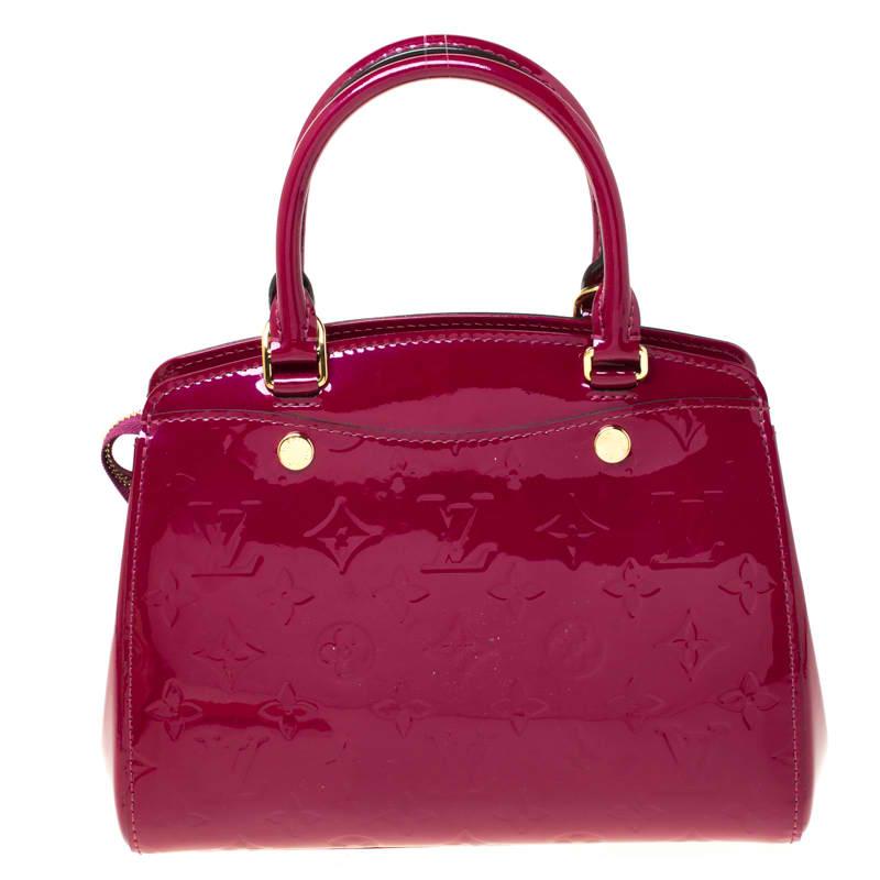 Louis Vuitton Brea's feminine shape is inspired by the doctor's bag. Crafted from signature Monogram Vernis patent leather, the bag has a perfectly polished finish. The fabric-lined interior is spacious and it is secured by a zipper. The bag