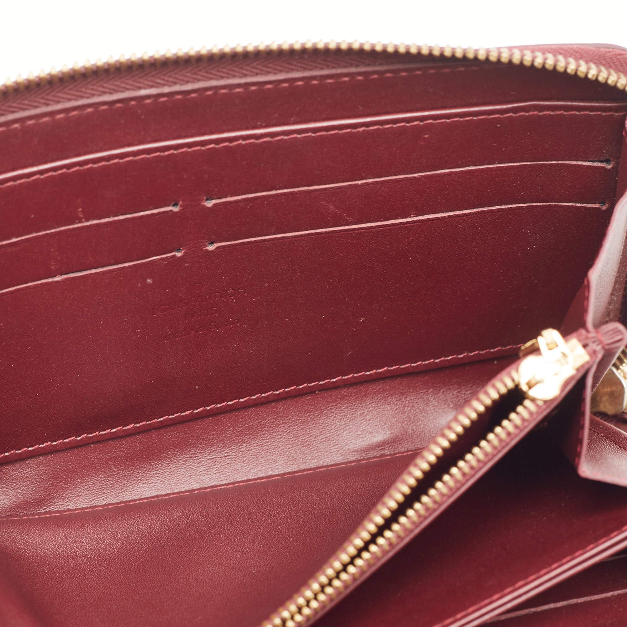 With a rich heritage and meticulous workmanship each creation of Louis Vuitton is sure to impress you with its notable features. This Zippy wallet is conveniently designed for everyday use. Crafted from Rouge Fauviste Monogram Vernis it is paired